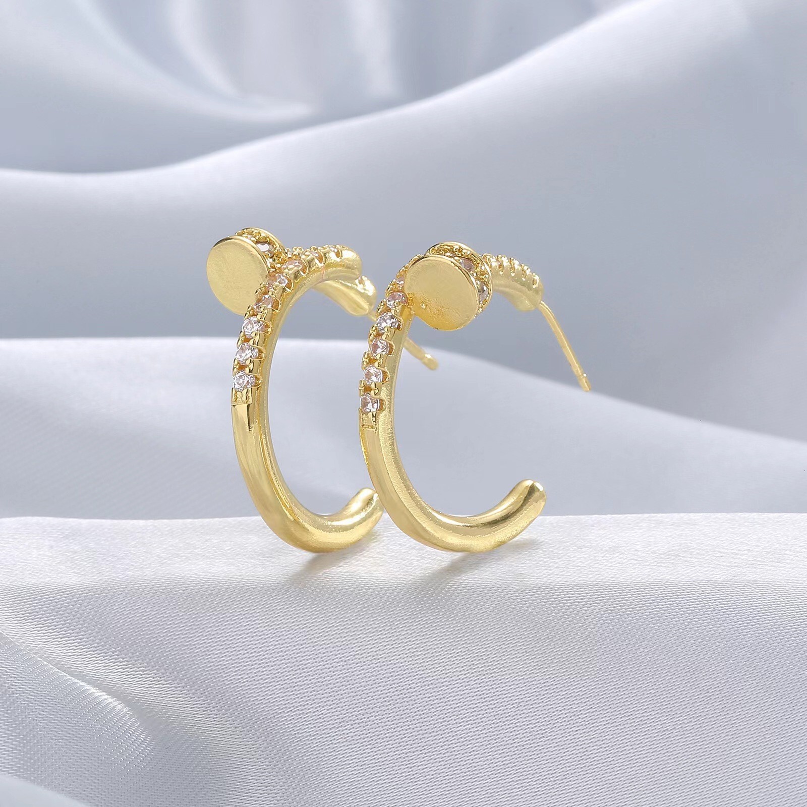 luxurious brand designer multipurpose fashionable earrings with copperset zirconia stud earrings the ear loops exude an elegant and sophisticated vibe