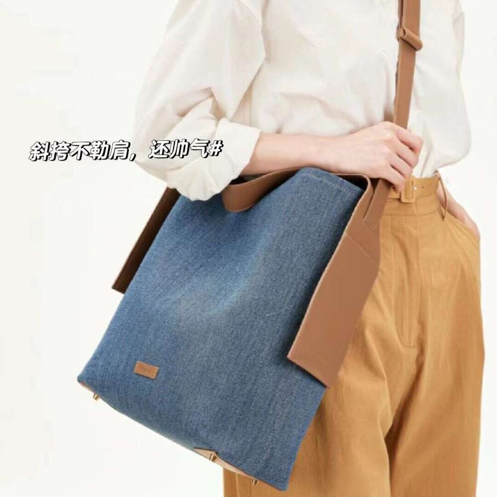 2026 New Genuine Leather Hanging Ear Tote Bag For Women 14 Inch Laptop Bag Large Capacity Shoulder Crossbody Bag Luxury Commute Bag SENYY