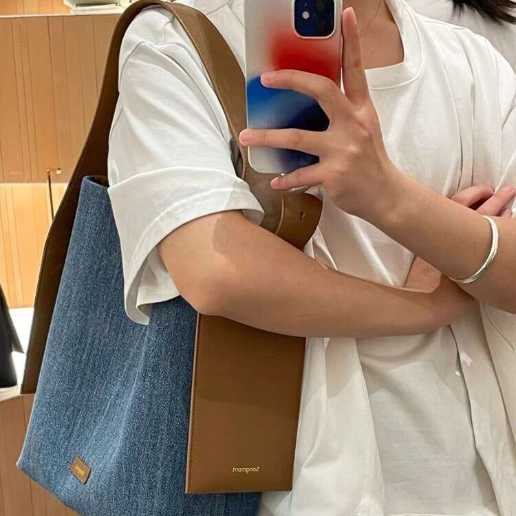 2026 New Genuine Leather Hanging Ear Tote Bag For Women 14 Inch Laptop Bag Large Capacity Shoulder Crossbody Bag Luxury Commute Bag SENYY