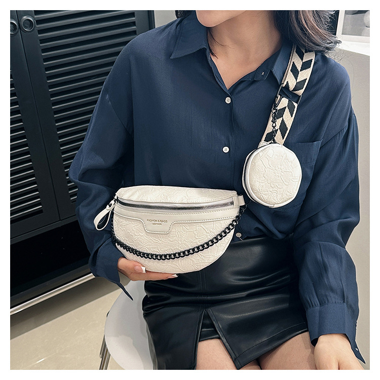 Retro women's chest bag with niche design embossed broadband single shoulder mother and child bag round cake headphone bag commuting shoulder bag
