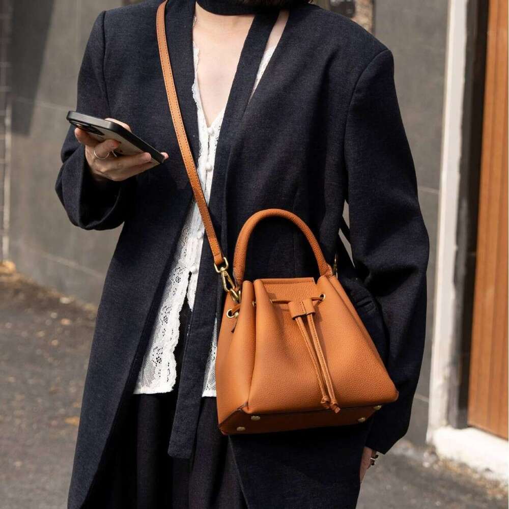 2026 New Togo Top Grain Cowhide Drawstring Bucket Bag Women Fashion Designer Style Large Capacity Genuine Leather Hobo Beach Bag Versatile Handbag SEN