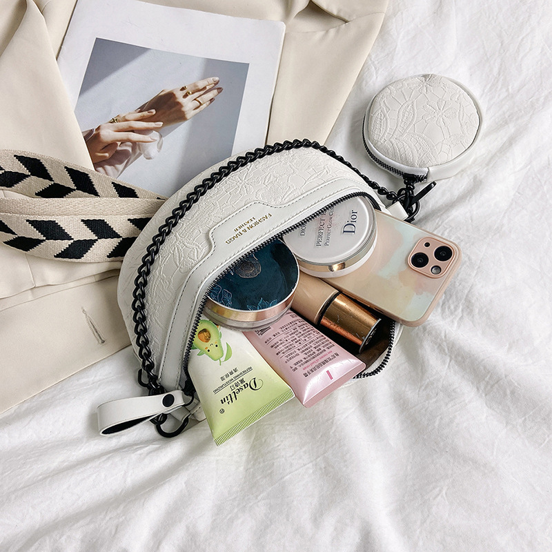 Retro women's chest bag with niche design embossed broadband single shoulder mother and child bag round cake headphone bag commuting shoulder bag
