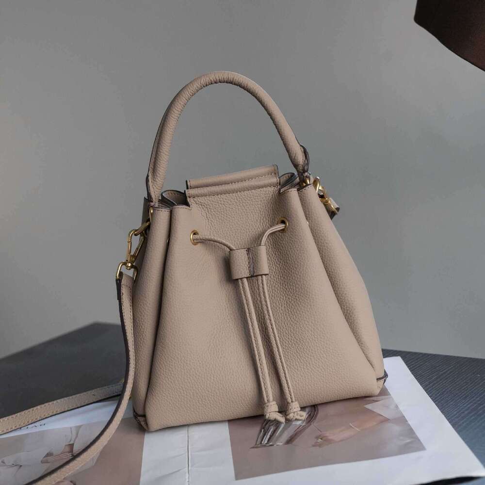 2026 New Togo Top Grain Cowhide Drawstring Bucket Bag Women Fashion Designer Style Large Capacity Genuine Leather Hobo Beach Bag Versatile Handbag SEN