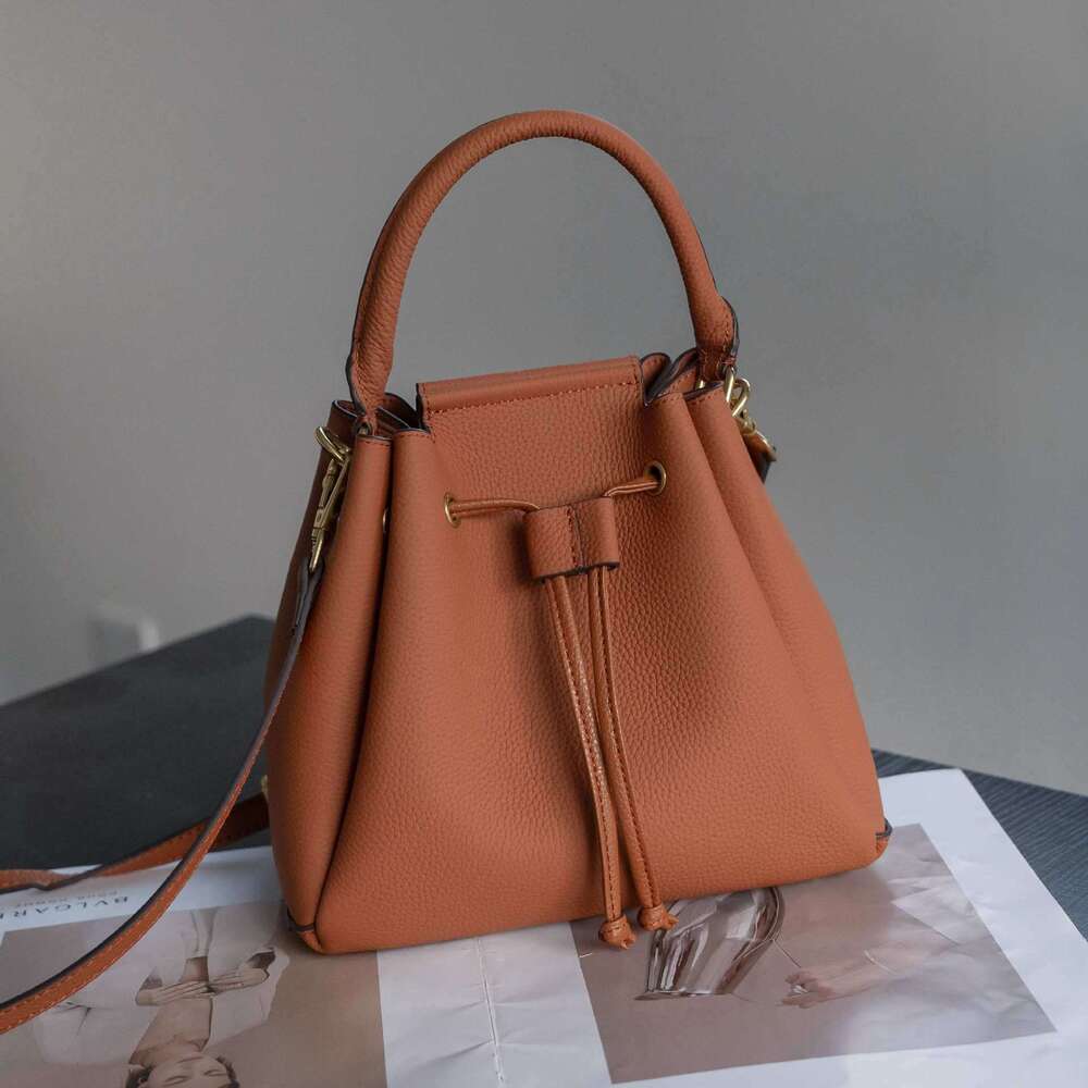 2026 New Togo Top Grain Cowhide Drawstring Bucket Bag Women Fashion Designer Style Large Capacity Genuine Leather Hobo Beach Bag Versatile Handbag SEN
