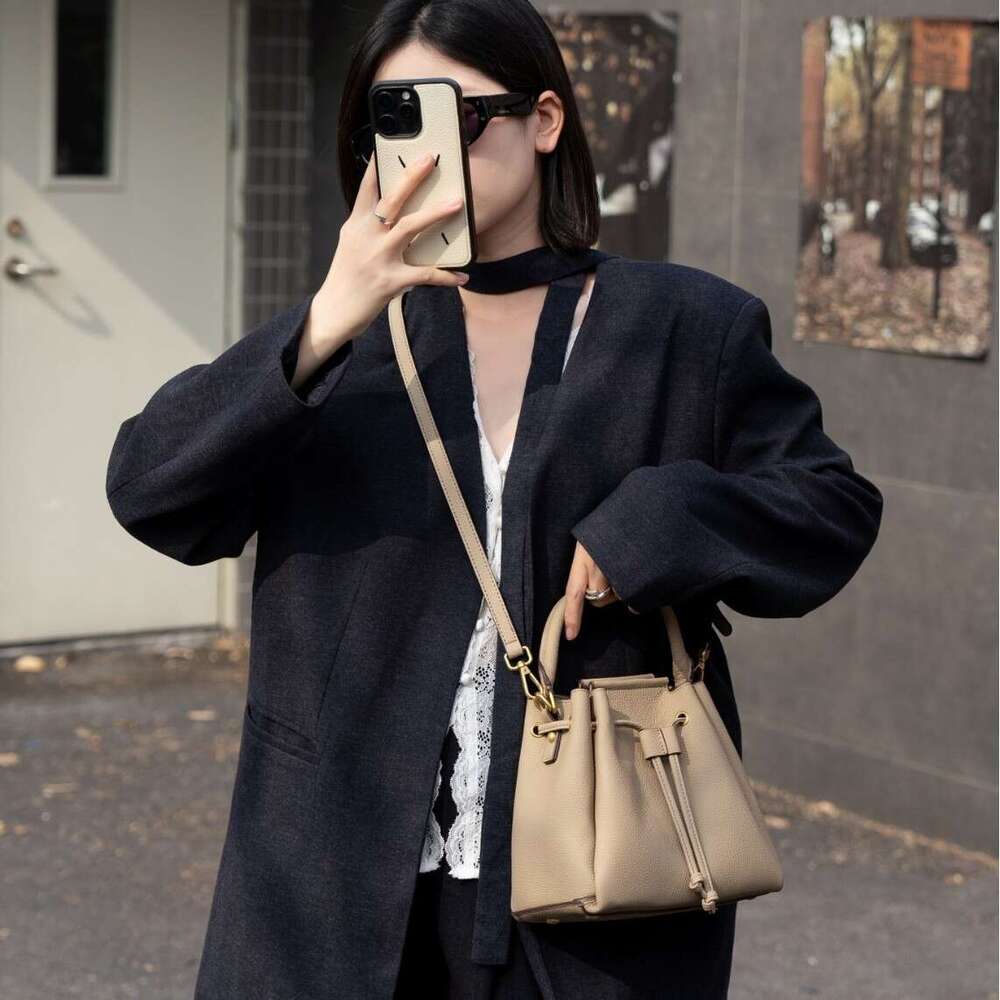 2026 New Togo Top Grain Cowhide Drawstring Bucket Bag Women Fashion Designer Style Large Capacity Genuine Leather Hobo Beach Bag Versatile Handbag SEN