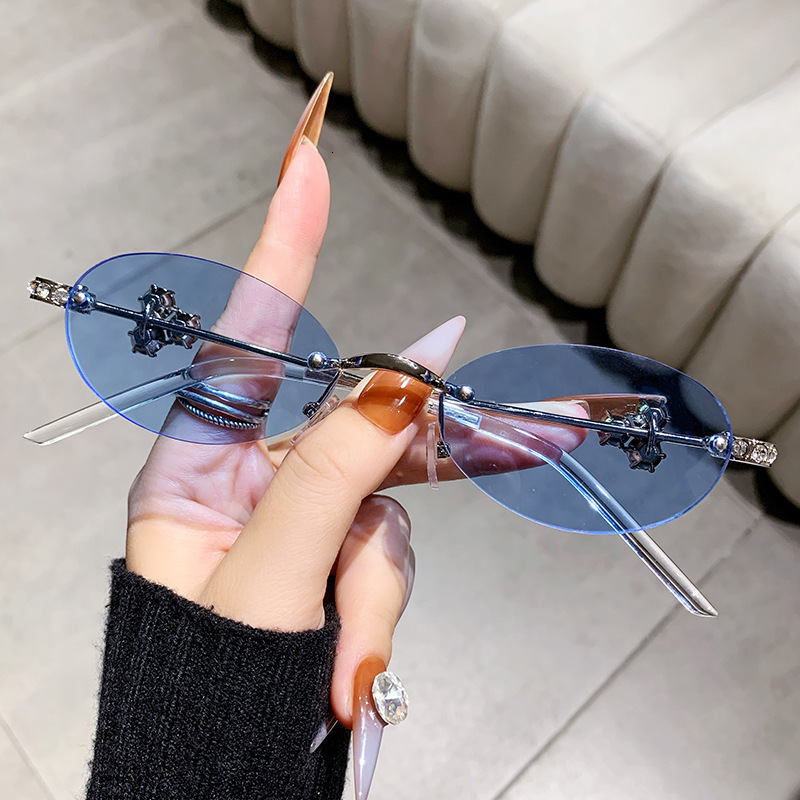 Fashion Diamond Inlaid Frameless Oval Shaped Women's Designer Sunglasses With Unique European And American Styles Versatile Street Style Sunglass