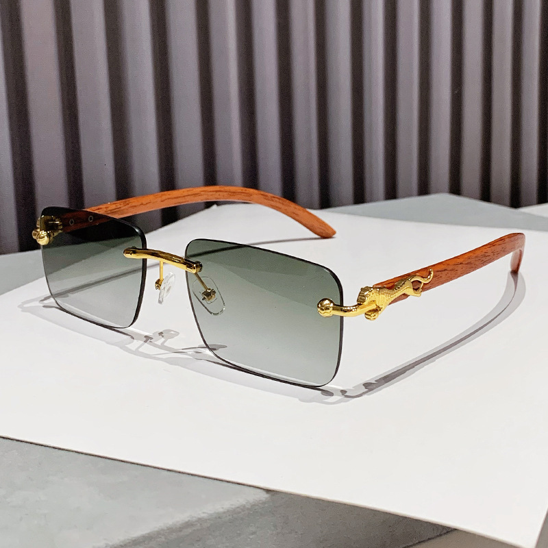 2025 New Fashionable Frameless Cutting Edge Outdoor Sunglasses Fashion Personality Leopard Pattern Arm Designer Sunglasses Cross Border Glasses Wholes