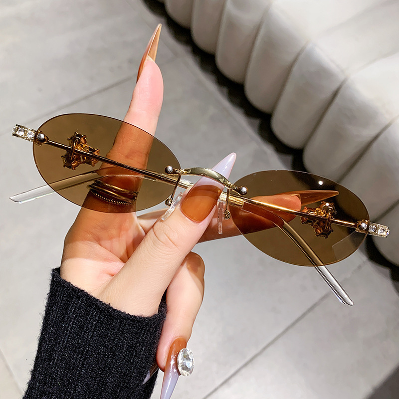 Fashion Diamond Inlaid Frameless Oval Shaped Women's Designer Sunglasses With Unique European And American Styles Versatile Street Style Sunglass