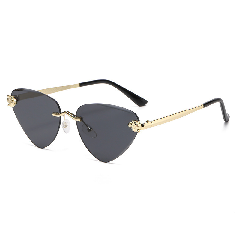 Cross Border Luxury Cat Eye Ocean Lens Designer Sunglasses New Metal Cutting Edge Outdoor Sunshade Sunglasses Runway Show Cheetah Triangle Glasses