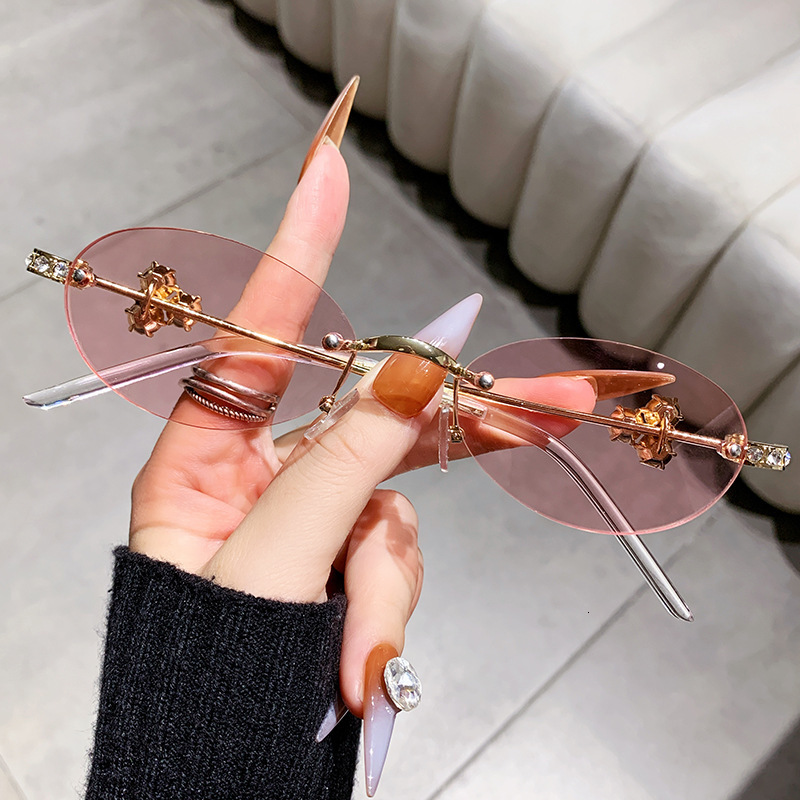 Fashion Diamond Inlaid Frameless Oval Shaped Women's Designer Sunglasses With Unique European And American Styles Versatile Street Style Sunglass