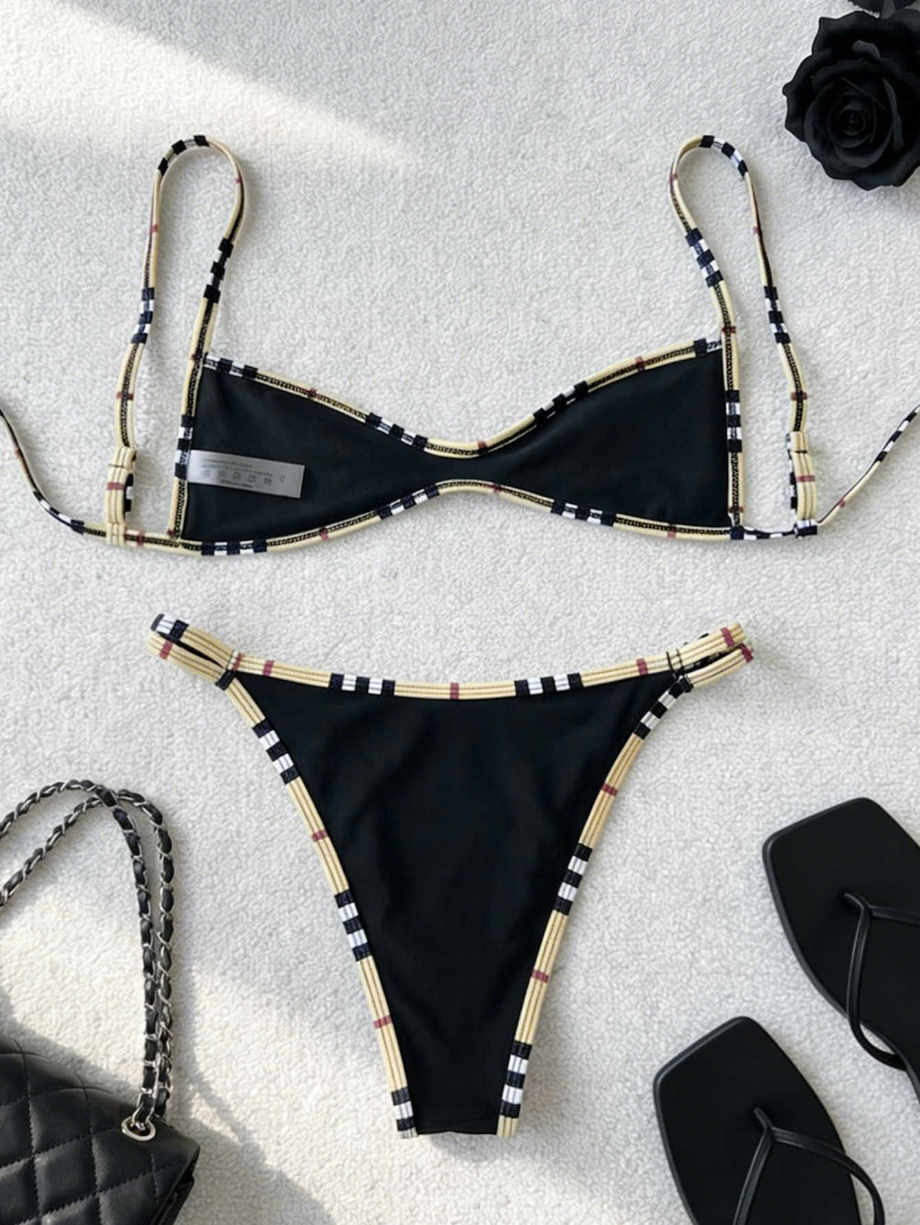 Best-selling bikini with plunging neckline, back exposure, and adjustable straps - a sexy one-piece swimsuit in a split design.T260303