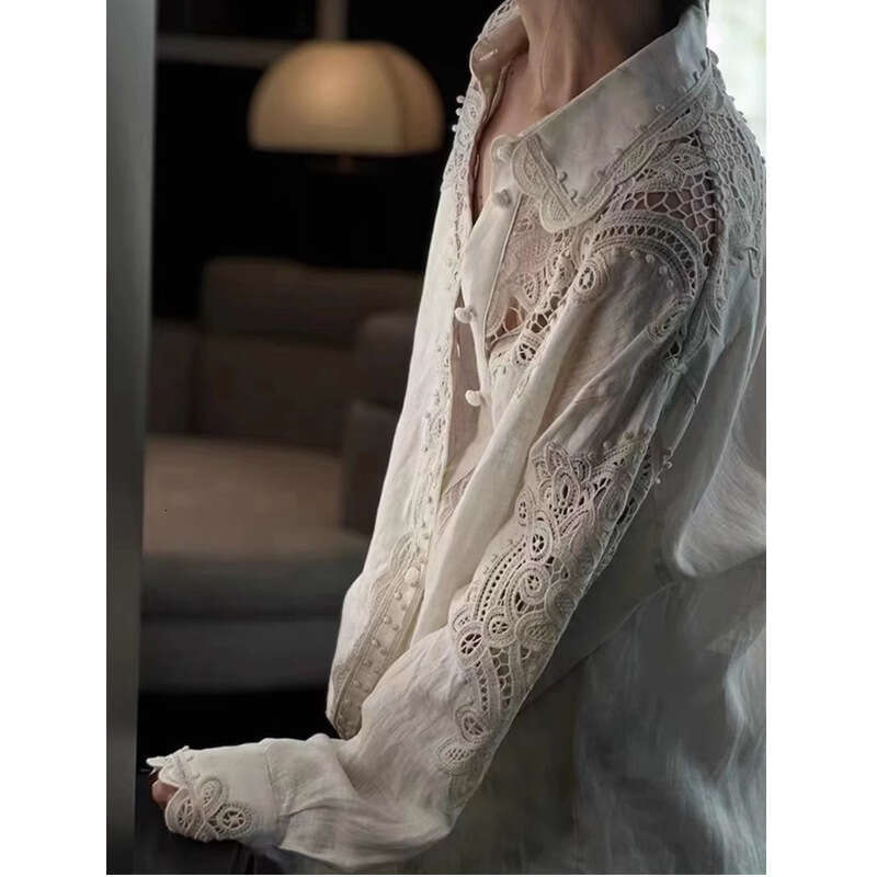 2026 New High-End Luxury Designer Women's Wear, Hollow-Out White Blouse, Elegant & Capable Loose Autumn Top, Fashion Office & Commute Style MAKOU