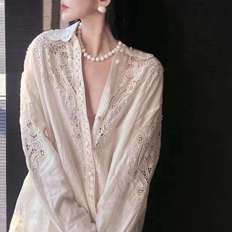 2026 New High-End Luxury Designer Women's Wear, Hollow-Out White Blouse, Elegant & Capable Loose Autumn Top, Fashion Office & Commute Style MAKOU