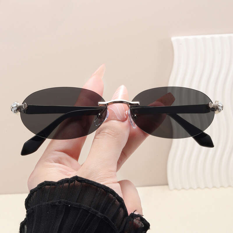 2026 New Women's Frameless Oval Sunglasses Unique Snake Head Design European American Style UV Protection Fashion Eyewear for Outdoor & Daily Wea