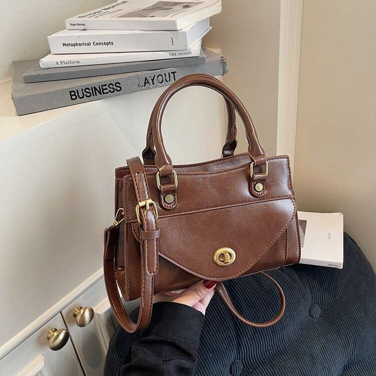 high-end fashion small square bag, 2025 autumn winter new model, solid color light luxury handbag, simple shoulder and crossbody bag