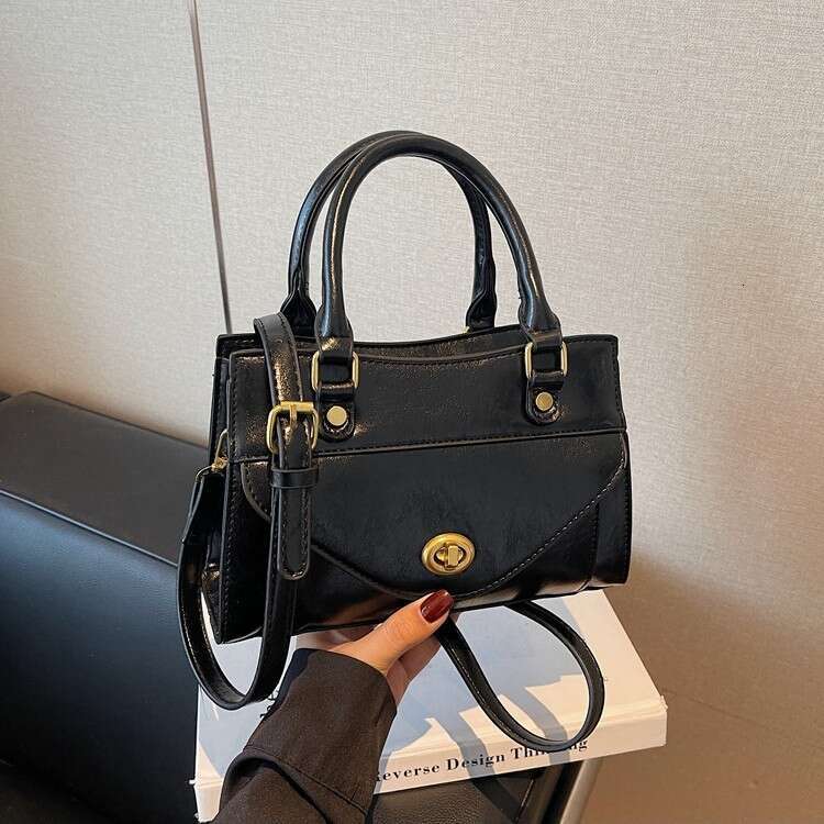 high-end fashion small square bag, 2025 autumn winter new model, solid color light luxury handbag, simple shoulder and crossbody bag