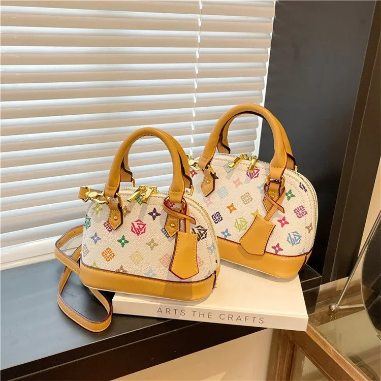WKwk premium sense 2025 new retro printed chain small square commuter shoulder oblique span bag women