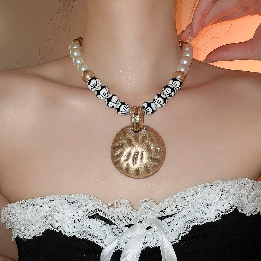 European American vintage ceramic beaded pearl necklace with distressed round pendant design, unique and sophisticated collarbone chain for women - view 5