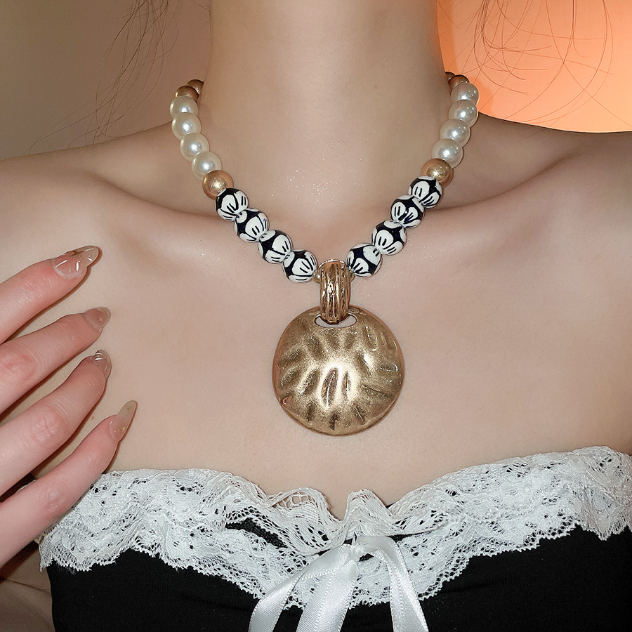 European American vintage ceramic beaded pearl necklace with distressed round pendant design, unique and sophisticated collarbone chain for women - view 3