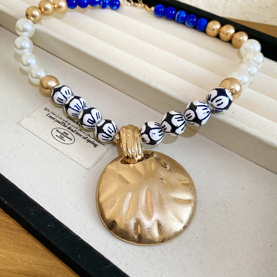 European American vintage ceramic beaded pearl necklace with distressed round pendant design, unique and sophisticated collarbone chain for women - view 4
