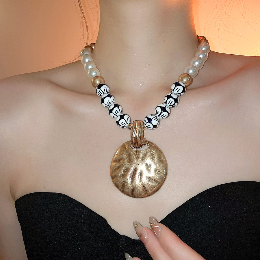 European American vintage ceramic beaded pearl necklace with distressed round pendant design, unique and sophisticated collarbone chain for women - view 9