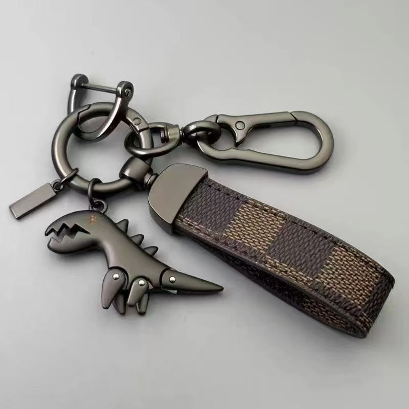 Cartoon cute little dinosaur keychain metal pendant for men, car couple style, high-end leather strap keychain for waist hanging