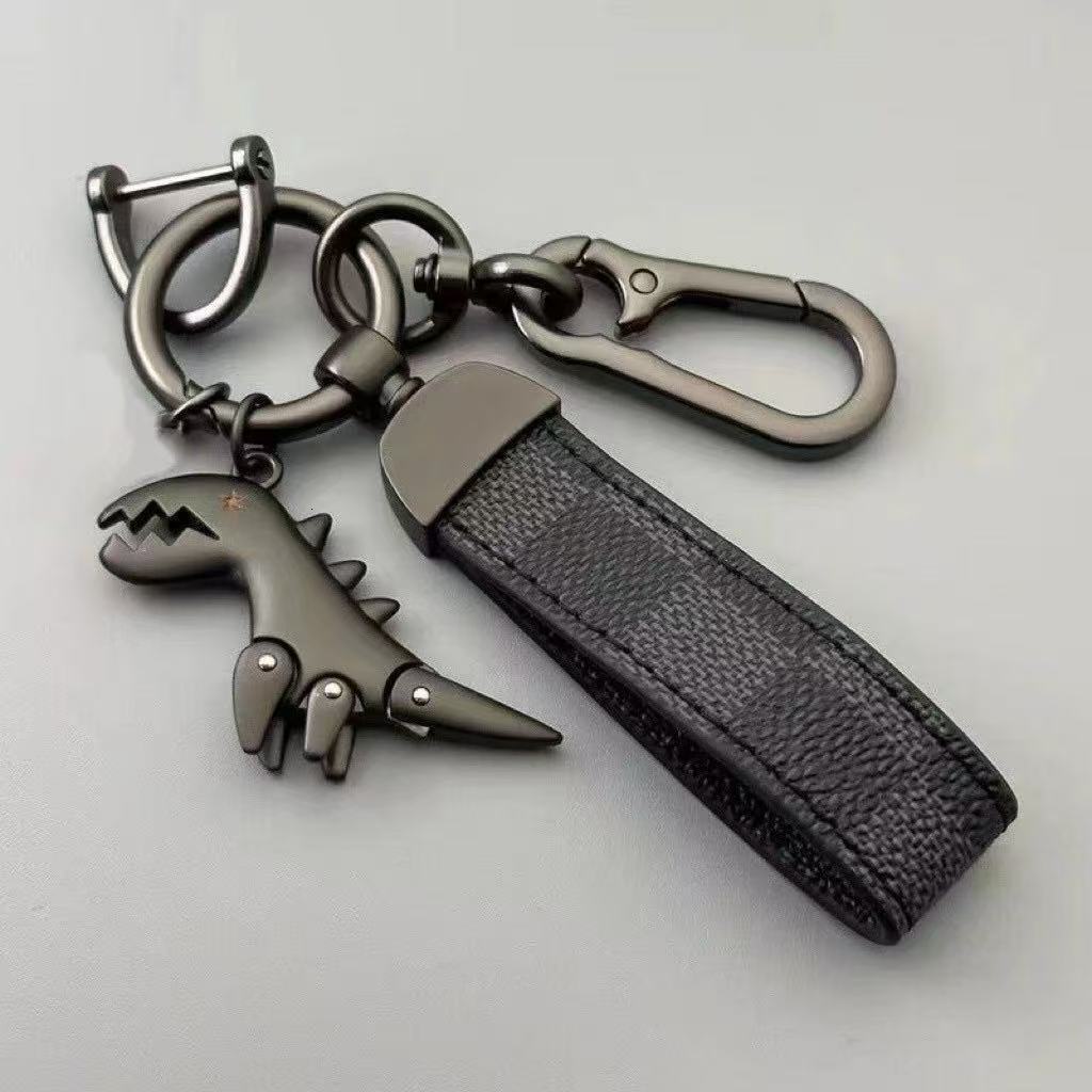 Cartoon cute little dinosaur keychain metal pendant for men, car couple style, high-end leather strap keychain for waist hanging