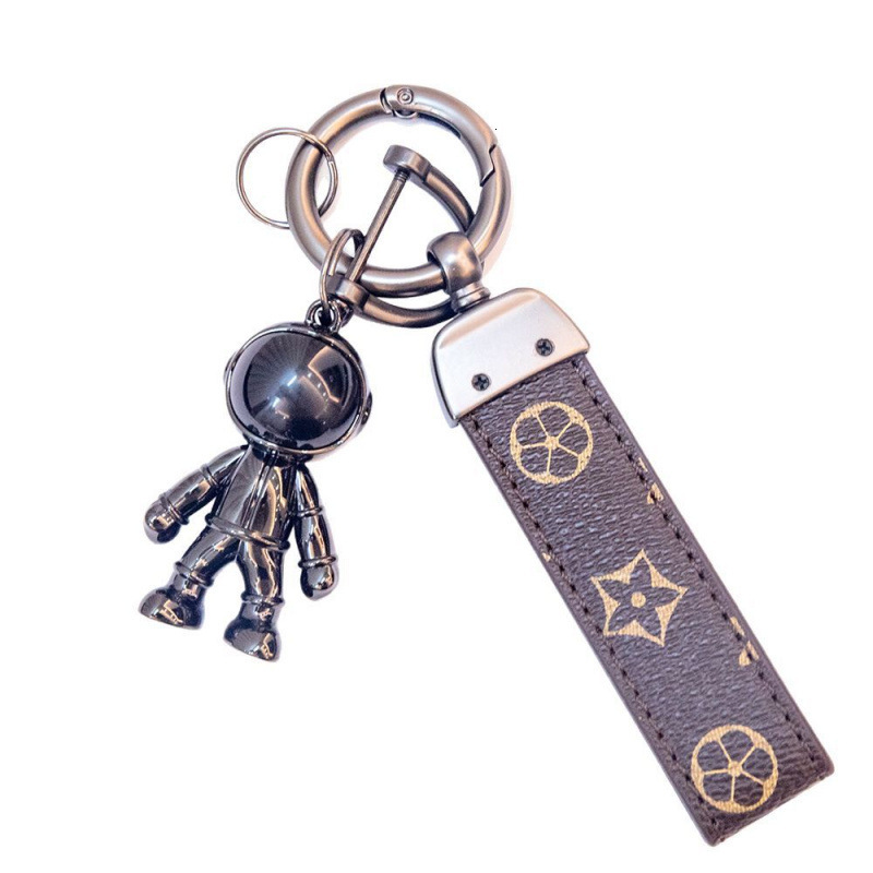 Creative high-quality metal astronaut 3D keychain couple pendant gift wholesale travel souvenir
