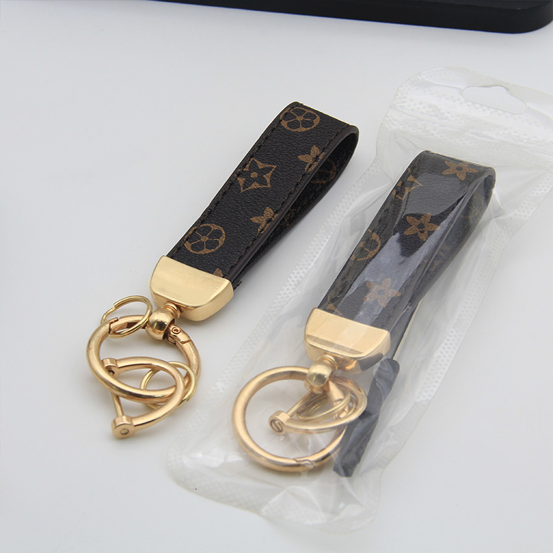 New floral leather high-end car keychain, light luxury fashion business men's keychain pendant accessory, factory wholesale