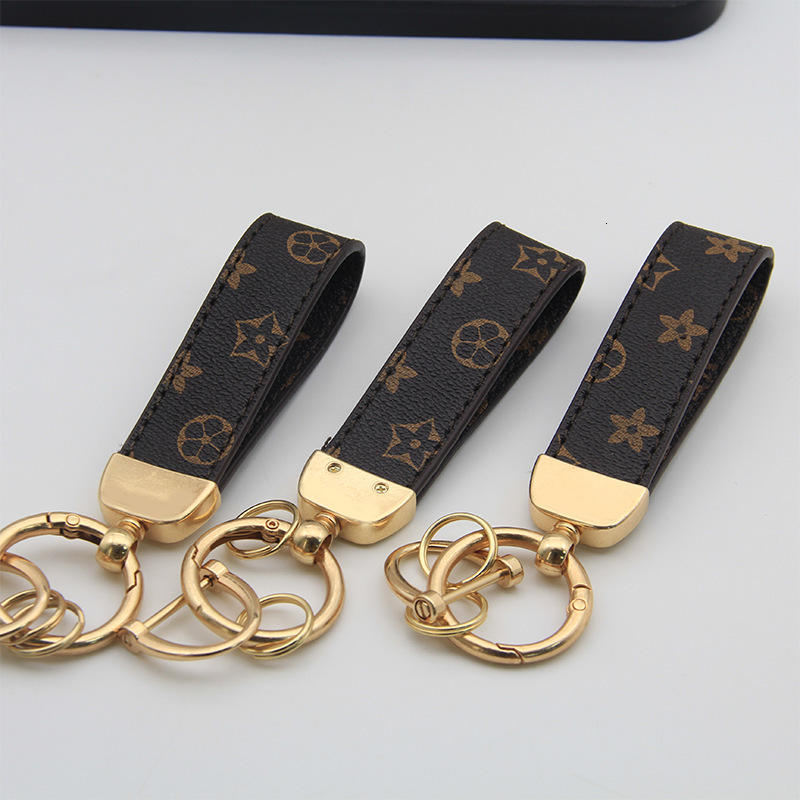 New floral leather high-end car keychain, light luxury fashion business men's keychain pendant accessory, factory wholesale