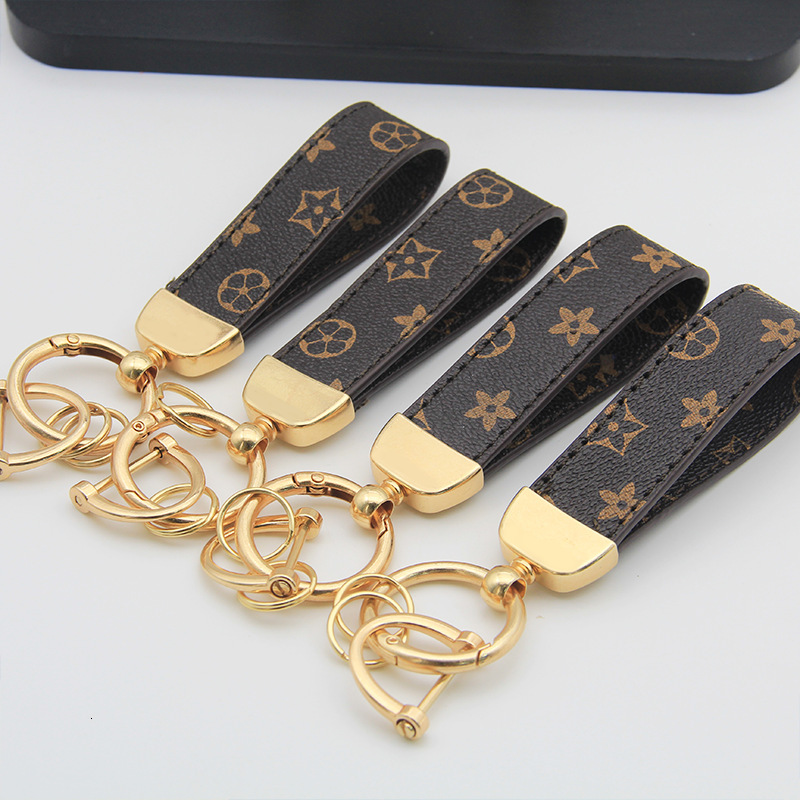 New floral leather high-end car keychain, light luxury fashion business men's keychain pendant accessory, factory wholesale