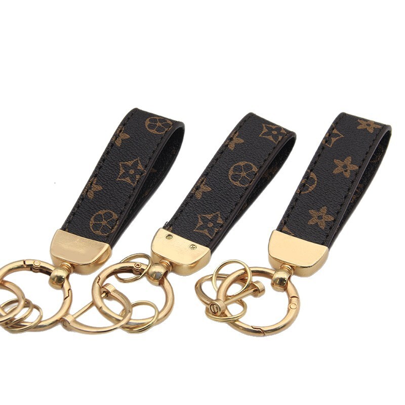 New floral leather high-end car keychain, light luxury fashion business men's keychain pendant accessory, factory wholesale