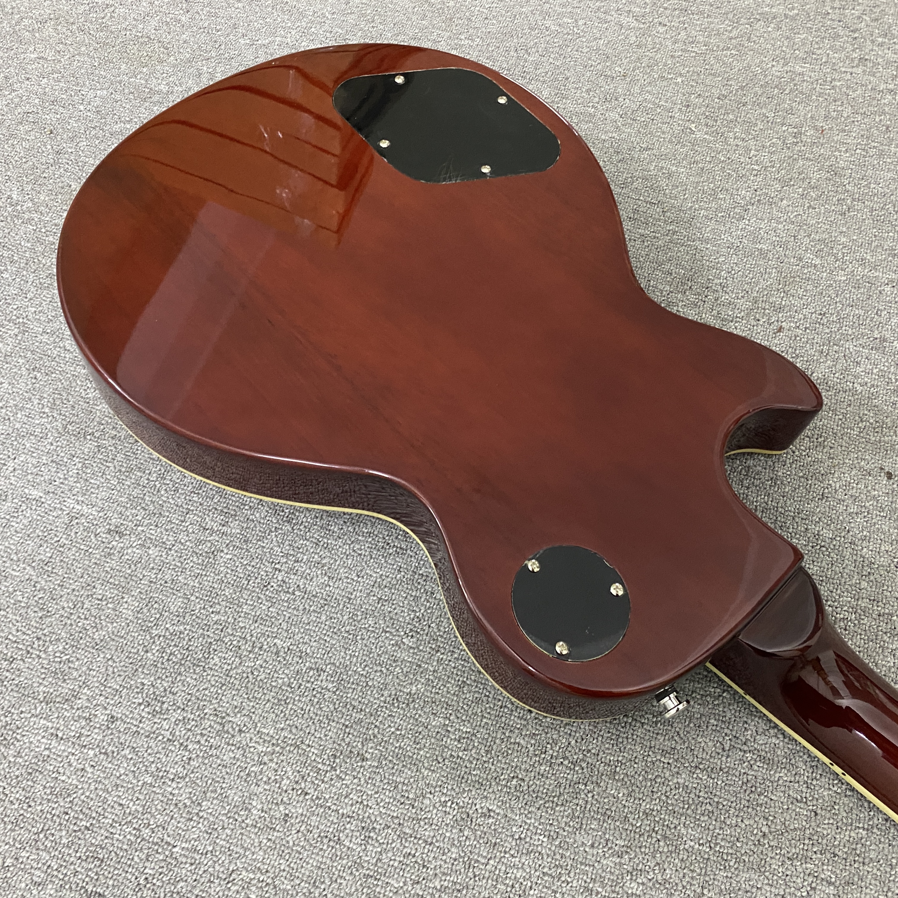 High-quality 6-string electric guitar with flame wood veneer, solid body, chrome hardware, HH pickups, mahogany body. Free shipping.