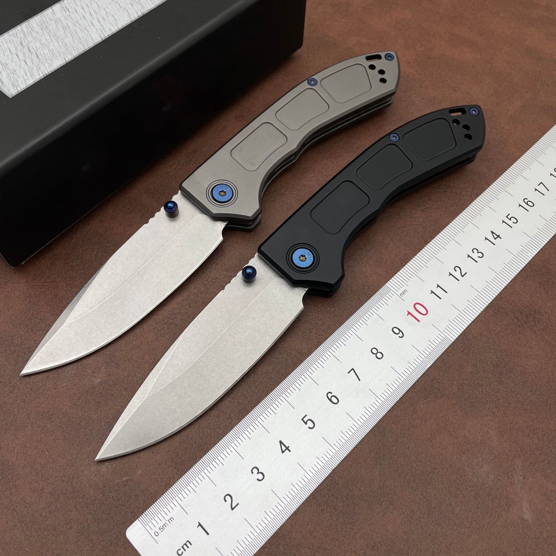 Tactical BM 748 Narrows Folding Knife 3.43" M390 Satin Blue Accents Outdoor EDC Tool Drop Point Blade Gray Titanium Handles