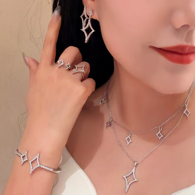 Minimalist zircon starburst hollow open ring, bracelet, and necklace set, light luxury high-end design jewelry for women - view 9