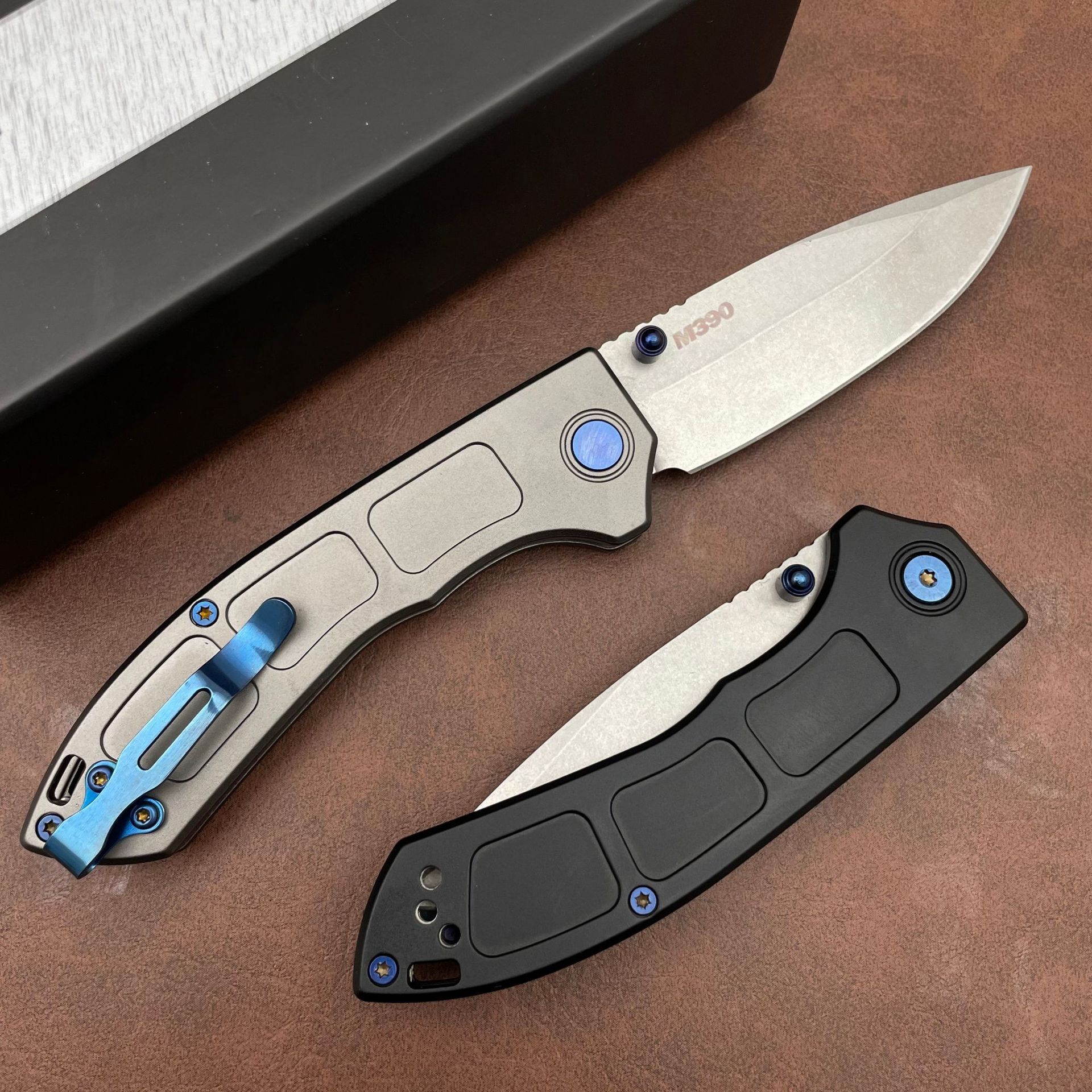 Tactical BM 748 Narrows Folding Knife 3.43" M390 Satin Blue Accents Outdoor EDC Tool Drop Point Blade Gray Titanium Handles