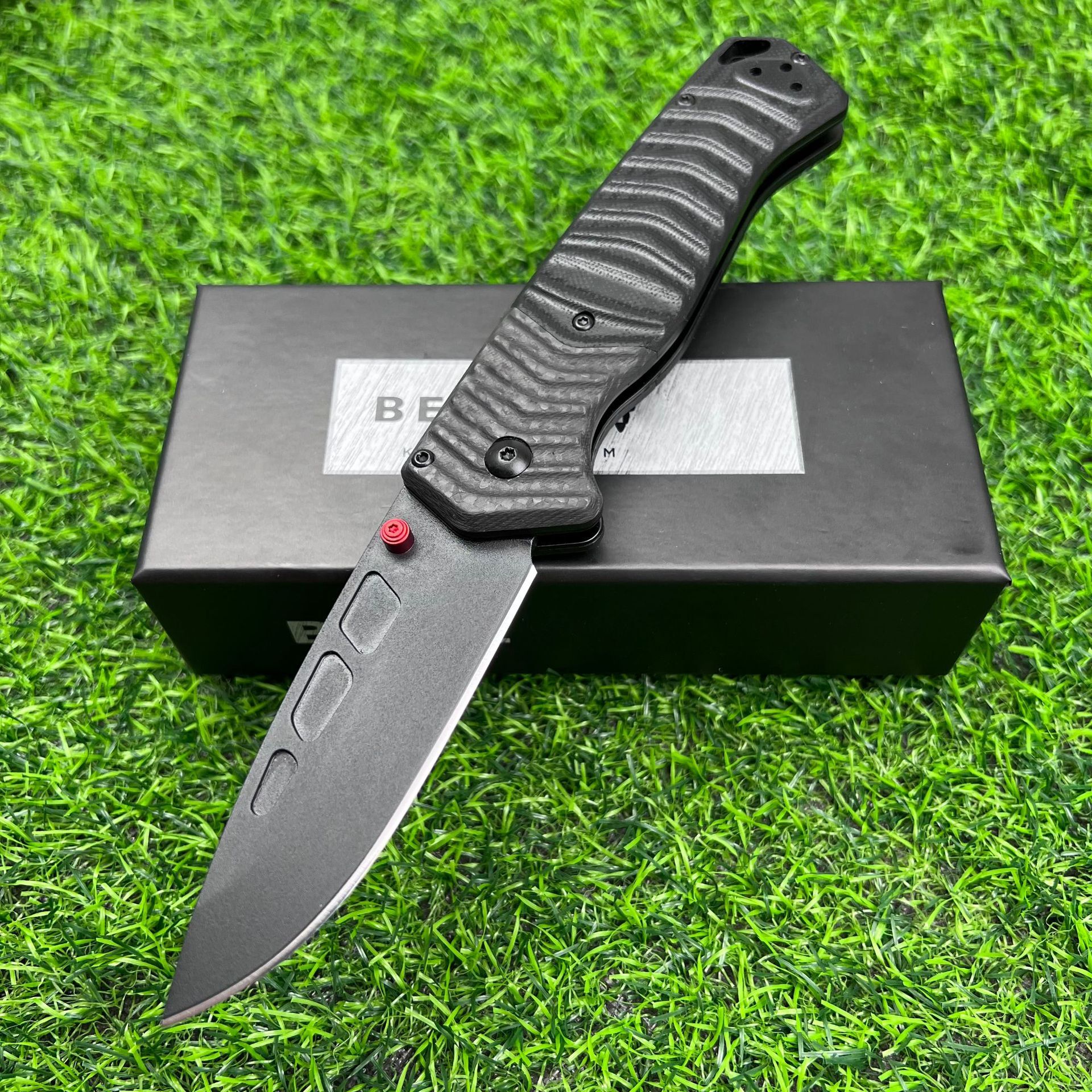 593BK folding knife with carbon fiber G10 handle, portable for outdoor use, high hardness and sharp blade, ideal for camping.