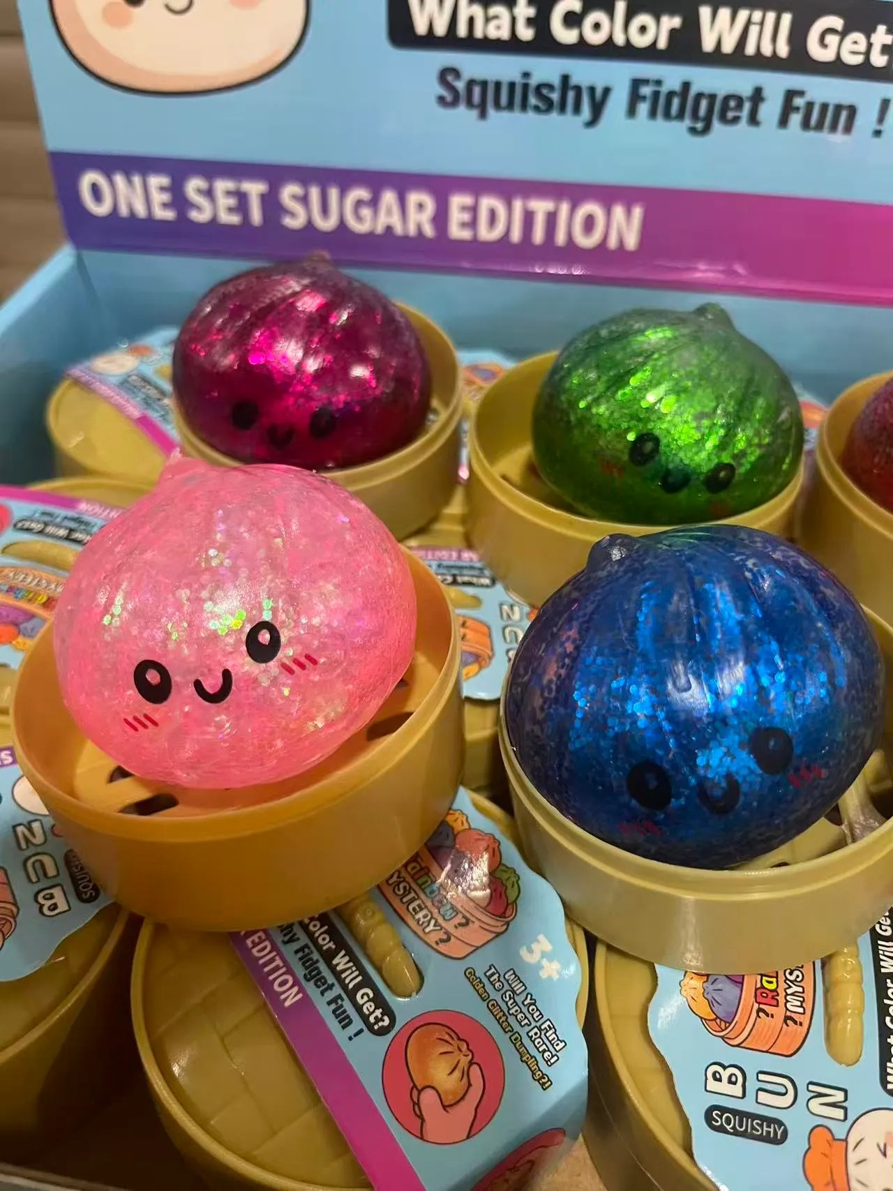 5.5CM Glitter Dumpling hape with Face Squishy Toy