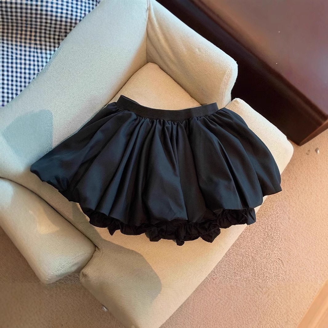2026 New Designer Luxury Brand Skirt Spicy Girl Riot Dew Fluffy Ultra Short Pants White Flower Bud Half Skirt Women Summer Petite High Waist A-line Wh