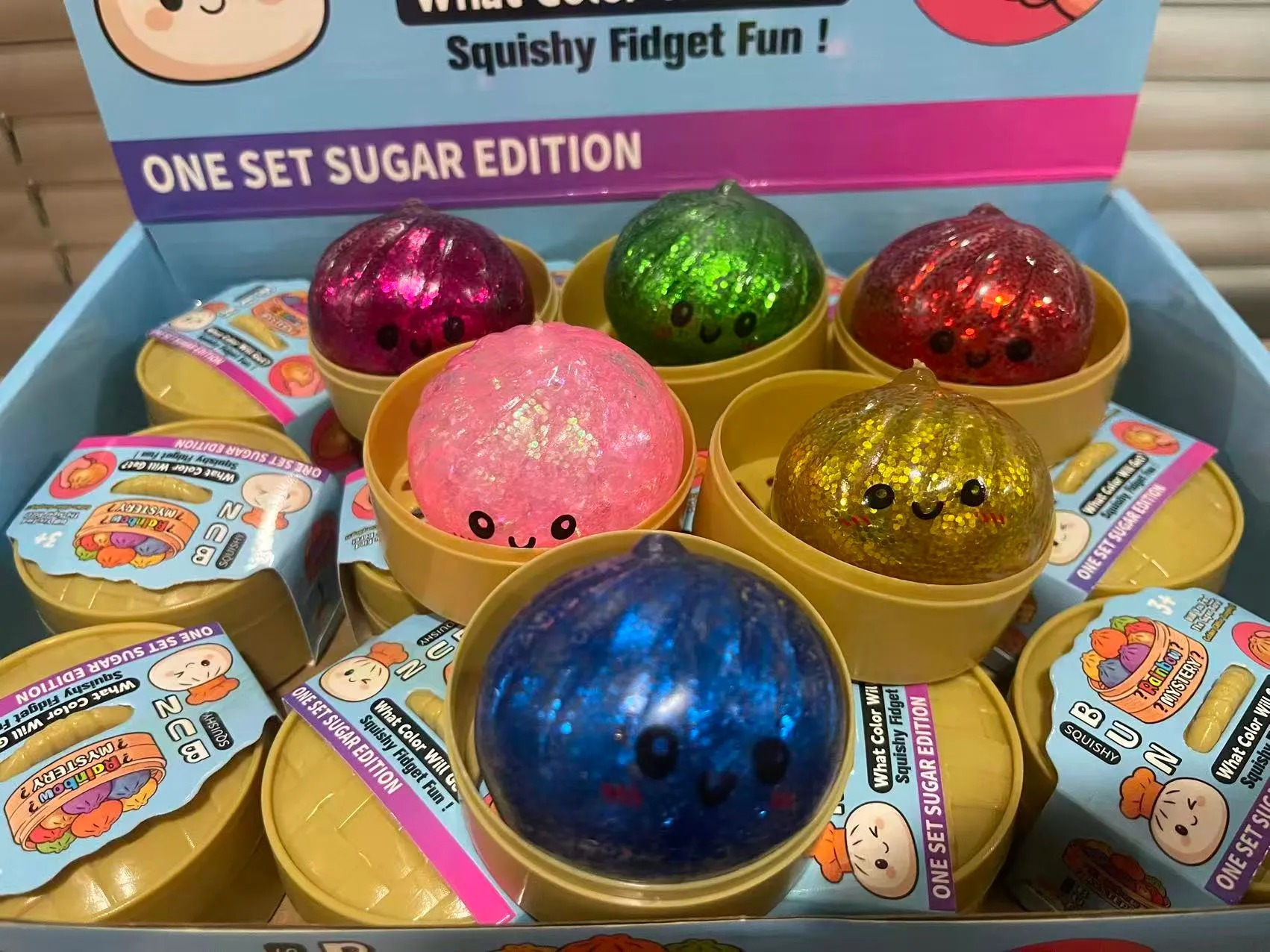 5.5CM Glitter Dumpling hape with Face Squishy Toy