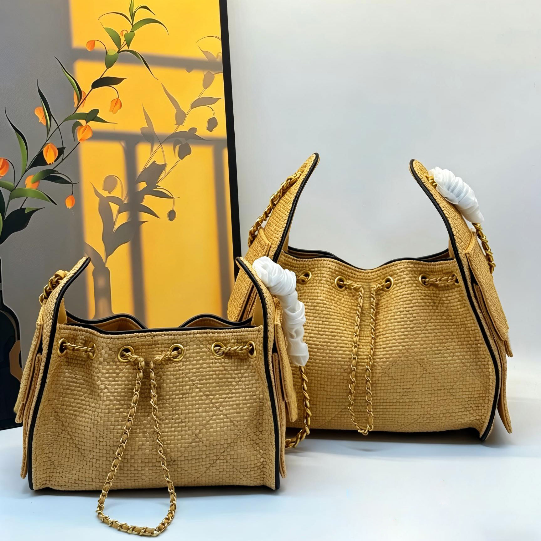 Straw Designer Bag Raffia Bucket Bag 25C Hobo Bag Shoulder Bag 2026 Summer Resort Luxury Woven Crossbody Bag Wicker Bag Gold Chain Straw Drawstring Bag Weekend Bag