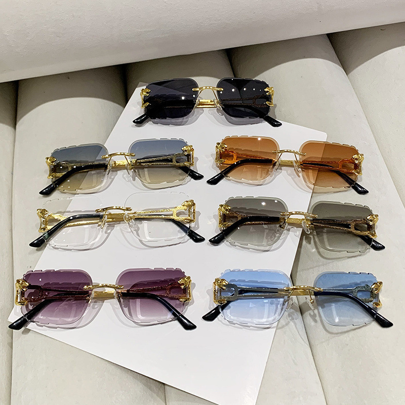 Designer Frameless leopard head sunglasses, metal sun glasses with irregular hollowed-out temples, women's high-end natural look sunshade glasses