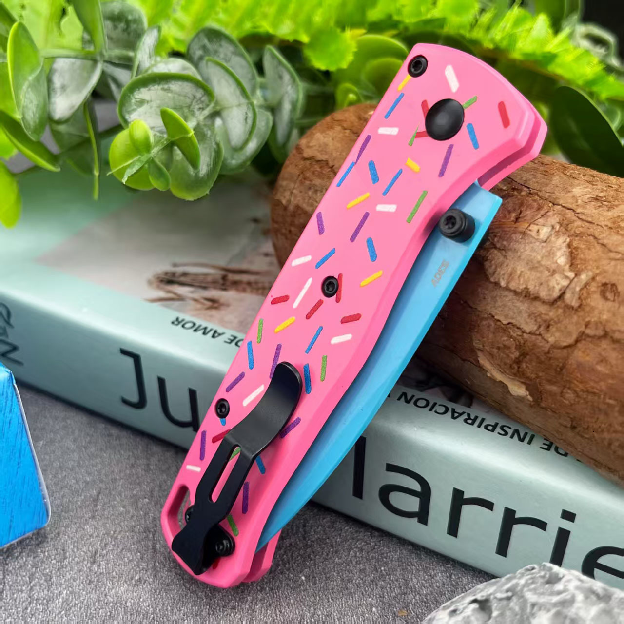 BM535 Bugout Donut Pink Aluminum Bearing folding knife