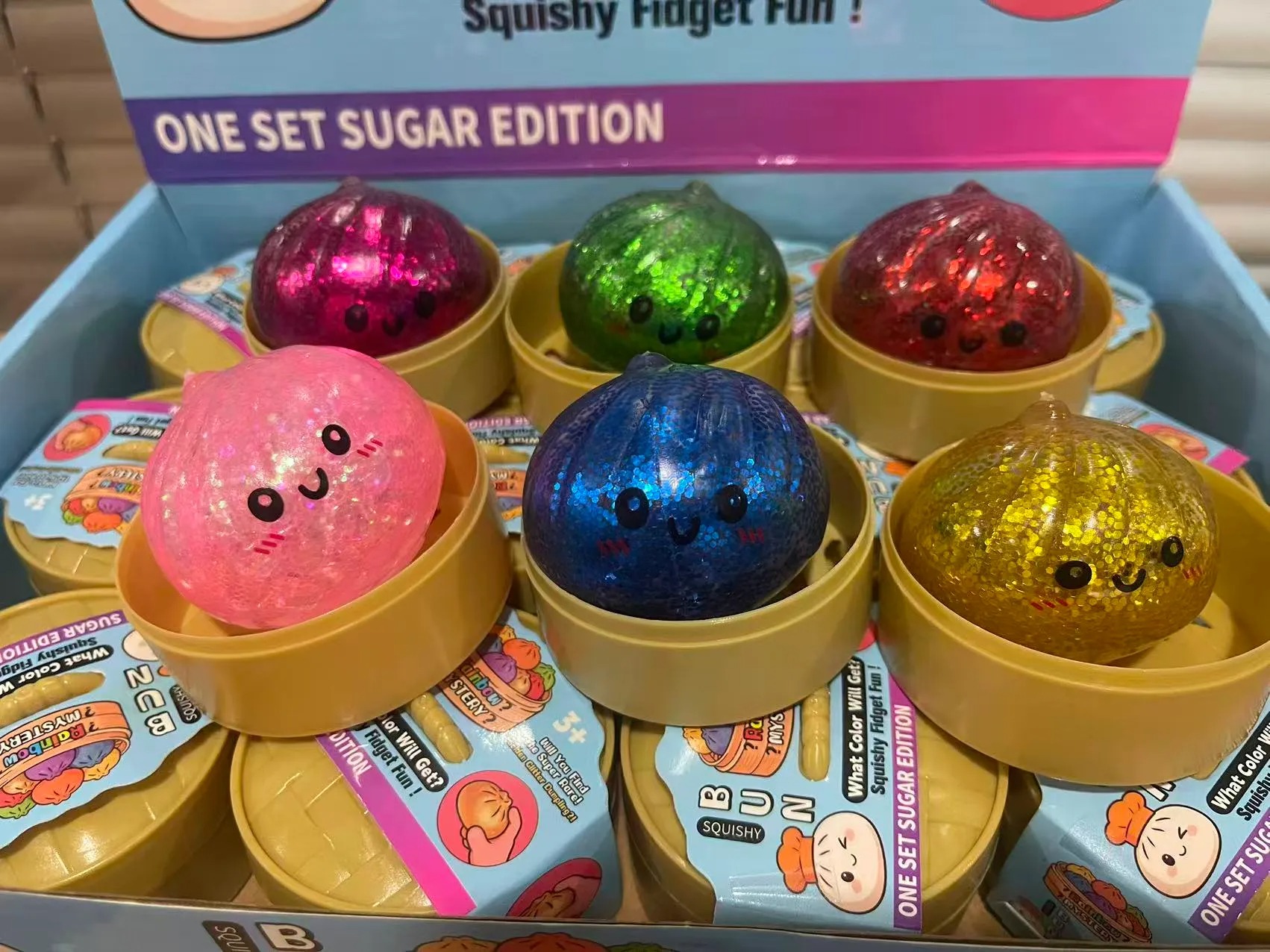 5.5CM Glitter Dumpling hape with Face Squishy Toy