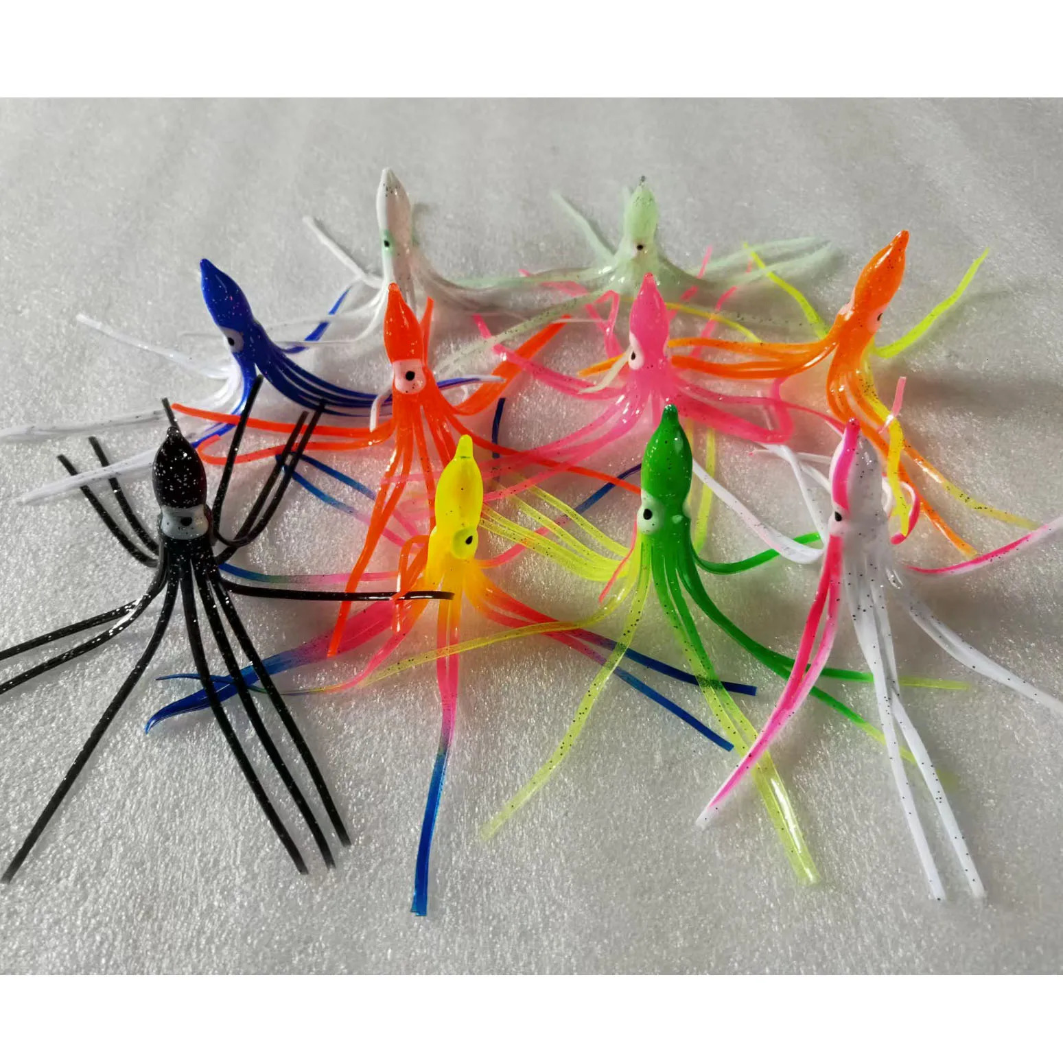 100pcs12cm fishing luresoft lure squid jigs saltwater octopus baitsoft siliconfishing skirte hook 260427