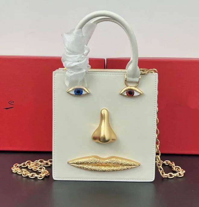 Master Quality,Designer Fashion Leather Unique Facial Features Trendy Personality Women's Handbag Stylish Bag Suotong260428