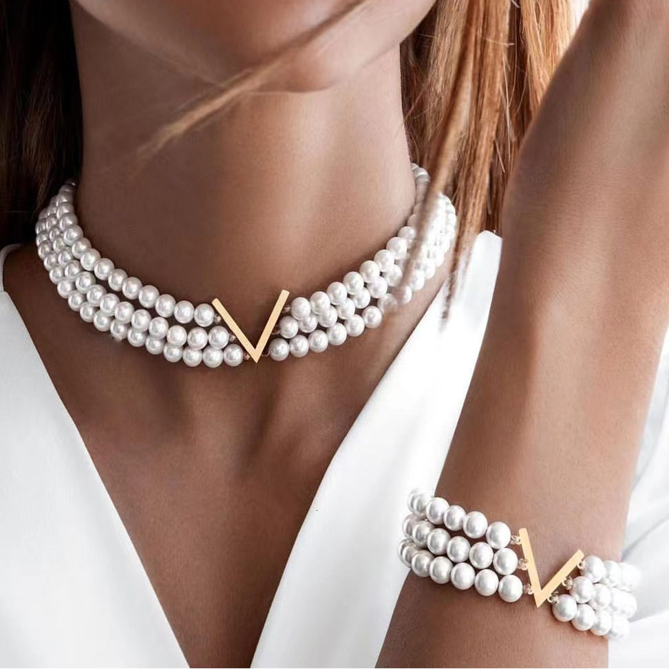 Designer multi-layer pearl jewelry set for women, ins-style European and American creative design V-neck choker, bracelet, necklace, earrings