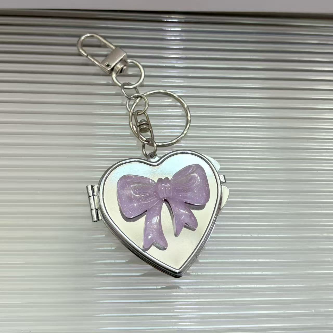 Free shipping Hot selling exquisite design silver bow love mirror keychain Y2K bag pendant practical fashion bagcharm