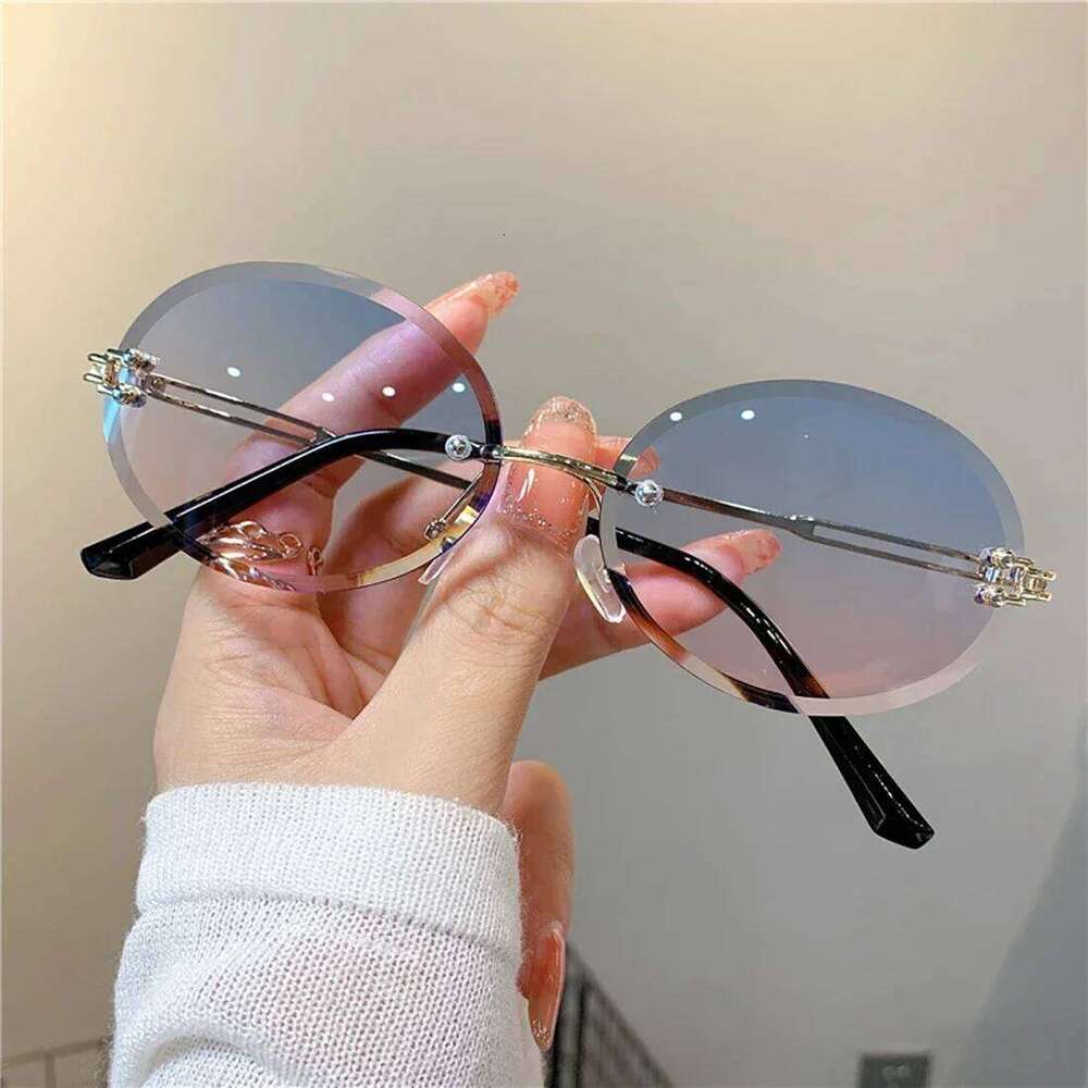 2024 Rimless Luxury Trendy Sunglasses Summer Cut-Edge Sunglass Oval Brand Designer Shades Women Sun Glasses Uv400 H260202
