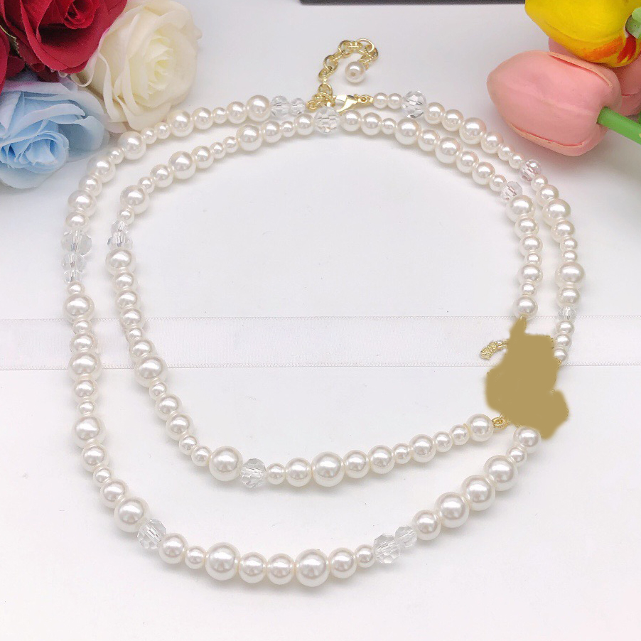 Pearl sweater necklace camellia Golden button
